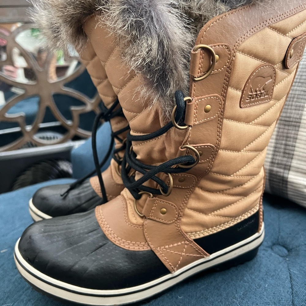 Sorel Tan and Black Winter Boots